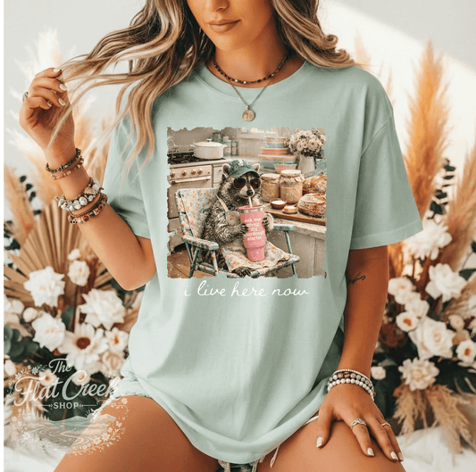 Sourdough Raccoon Shirt – "I Live Here Now" Cozy Kitchen TeeSThe Flat Creek Shop LLC